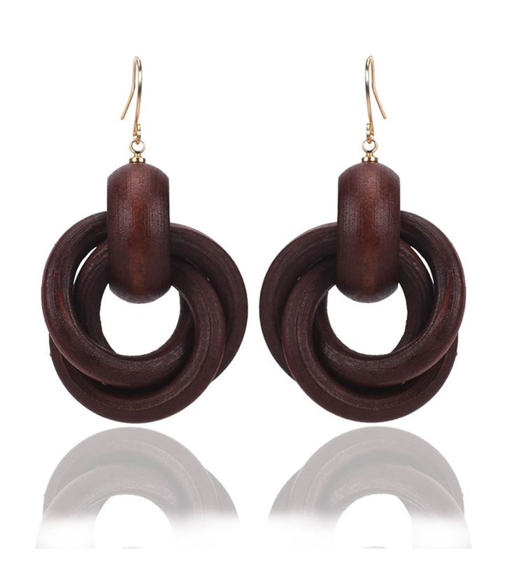 PRICES MAY VARY. Dangle earrings material: Wood + Alloy. Beautiful in a fashion look. Handmade Diy. Hoop earrings size: 5.5*3.2 cm. Net Weight: 10g. Design is elegant and looks very charming. Lightweight comfortable to wear. Perfect gift to your loved ones, like lover, girlfriend, wife, fiancee, daughter, your female friends, or even yourself for valentine's day, birthday, Christmas day, and so on. These earrings jewelry can show the beauty and personality of women.Its not only summer jewelry an Afrocentric Earrings, Wood Jewelry, Cross Ring, Wooden Earrings, Dangling Earrings, Wood Earrings, Online Earrings, Earrings Vintage, Wood Jewellery