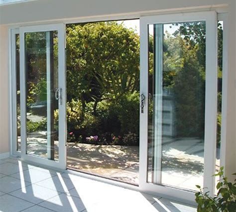 an open patio with sliding glass doors leading outside