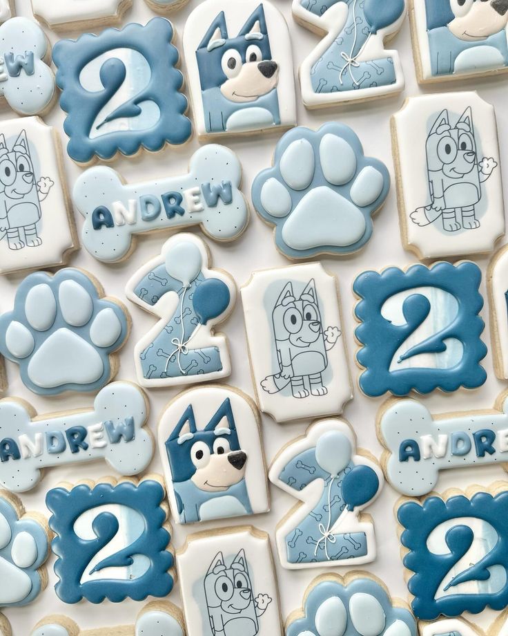 decorated cookies with cartoon characters and numbers on them