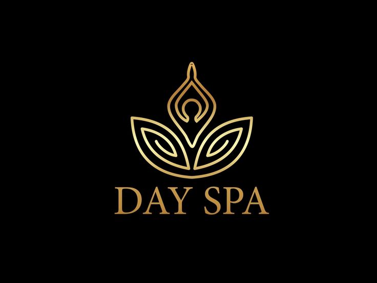 the logo for day spa, which is located in front of a black background with gold leaves