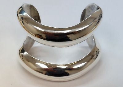 TIFFANY&CO ELSA PERETTI STERLING SILVER OPEN CENTER CUFF BRACELET 1984  | eBay Elsa Peretti Style, Contemporary Silver Open Band Jewelry, Luxury Silver Open Cuff Bracelet, Classic Open Ring Bracelets For Formal Occasions, Formal Polished Open Band Bangle, Luxury Silver Open Cuff Bracelets, Silver Open Cuff Bracelet With Polished Finish, Silver Open Band Bangle With Polished Finish, Formal Sterling Silver Open Cuff Bracelet