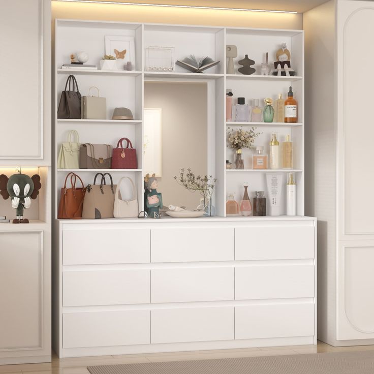 a large white cabinet with many purses and handbags on it's shelves