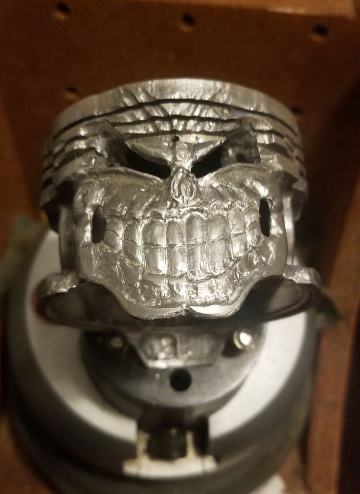 a metal object with an animal's head on it