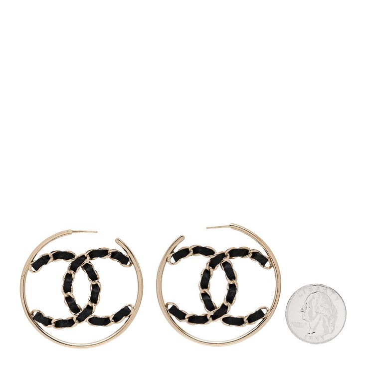 This is an authentic pair of CHANEL Lambskin CC Chain Hoop Earrings in Black and Gold. These gold tone earrings feature the Chanel logo with a hanging turnlock charm with black leather weaving throughout the earring. Chain Hoop Earrings, Chanel Logo, Leather Thread, Leather Weaving, Earrings Black, Lovely Earrings, Lambskin Leather, Black And Gold, Gold Chains