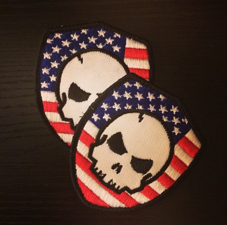 two patches with skulls on them and an american flag design in the shape of hearts