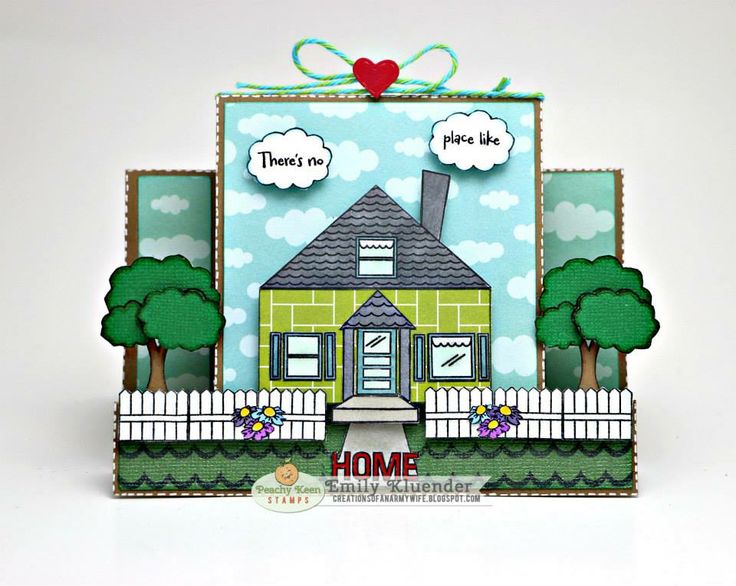 a card with a house and trees on it