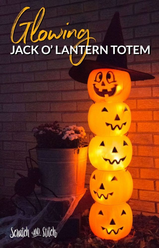 glowing jack o'lantern totem with pumpkins on it