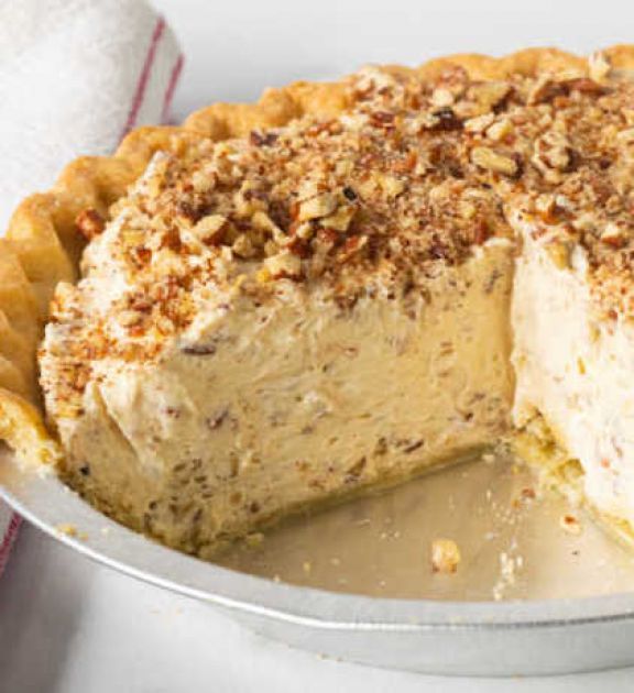 a pie sitting on top of a metal pan