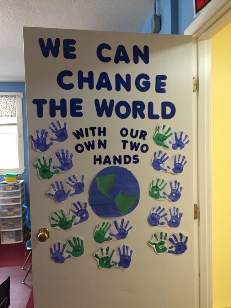 we can change the world with our own two hands bulletin board for classroom decorating