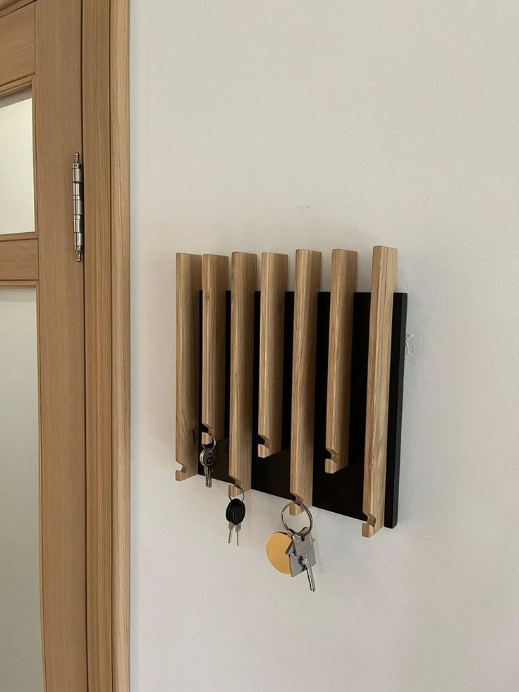 there is a key holder on the wall