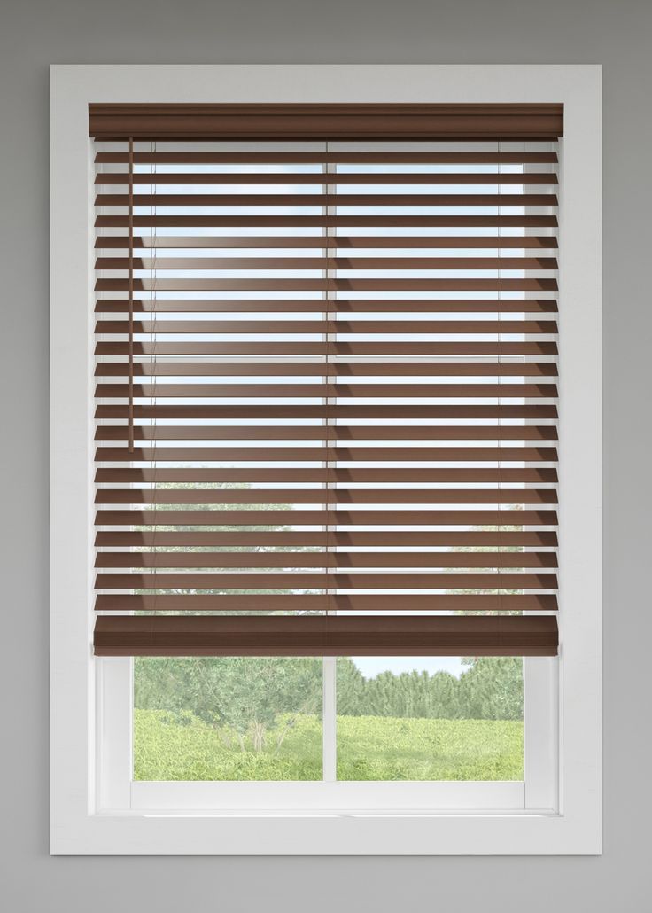 an open window with blinds in it