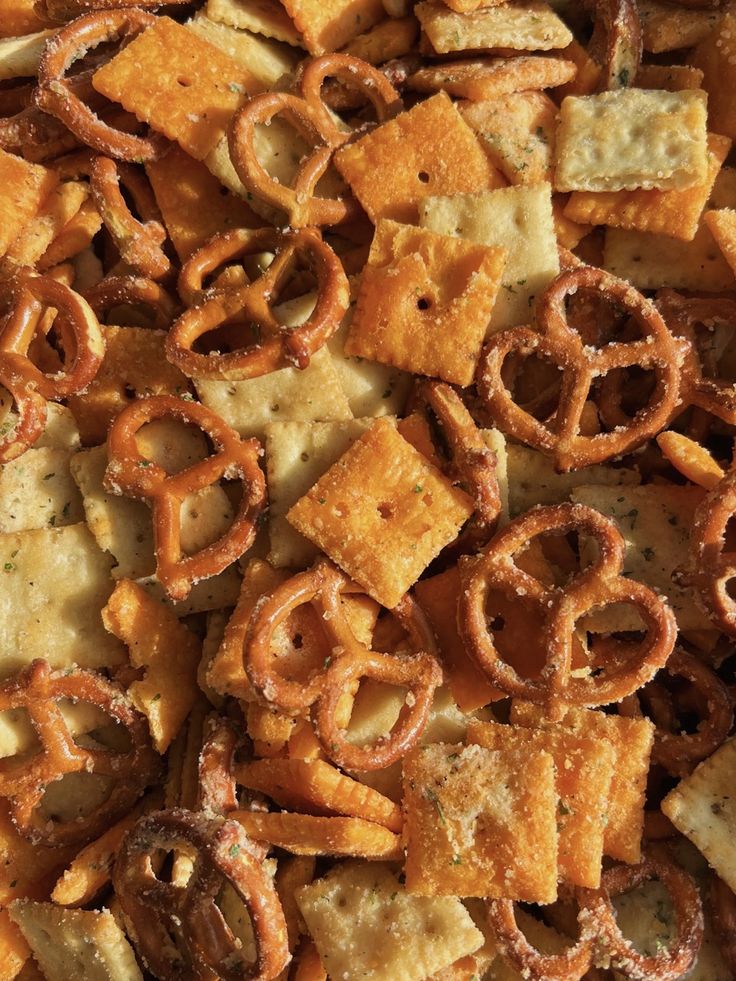 close up view of cheesy crackers and pretzels