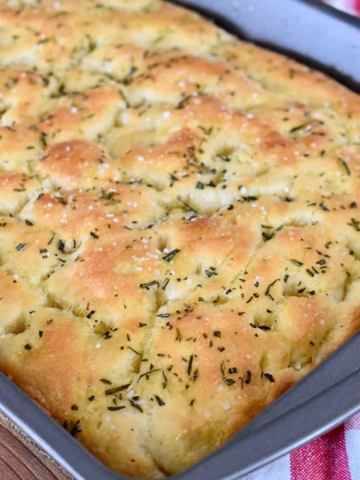 a loaf of bread in a pan on top of a table