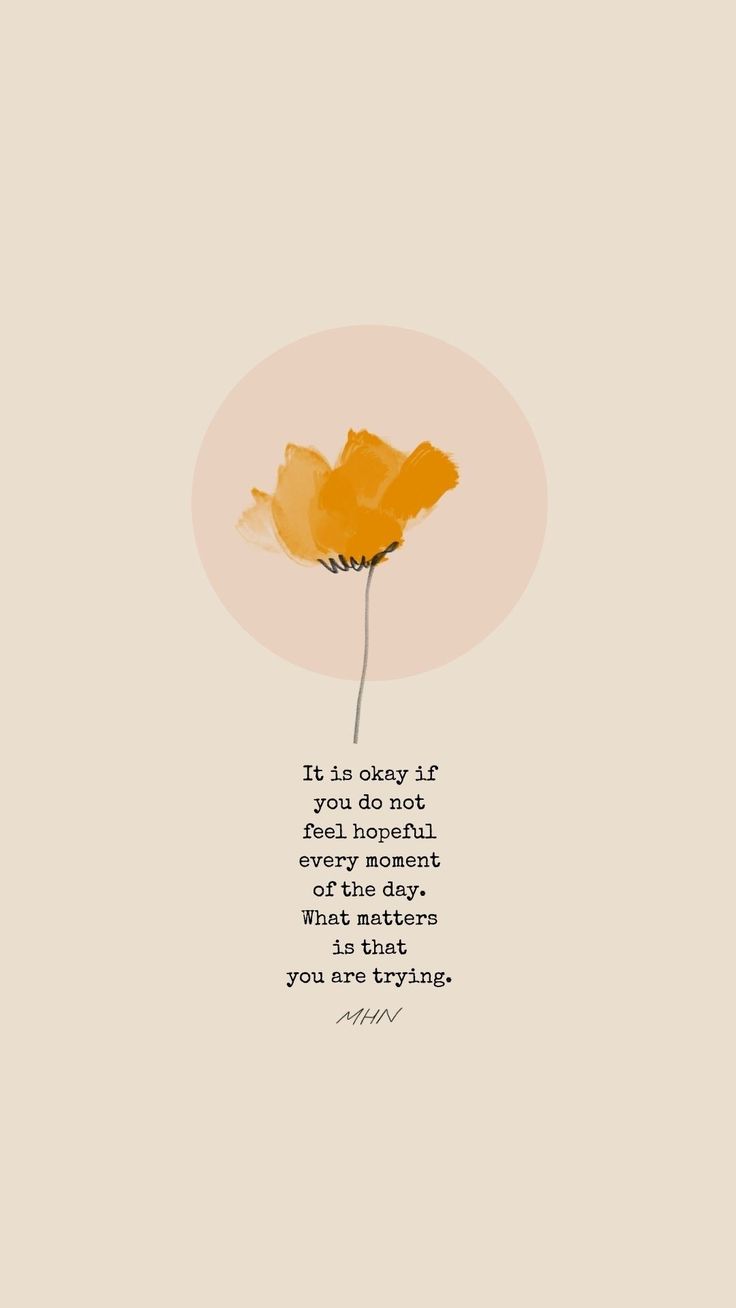 an orange flower with a quote on it