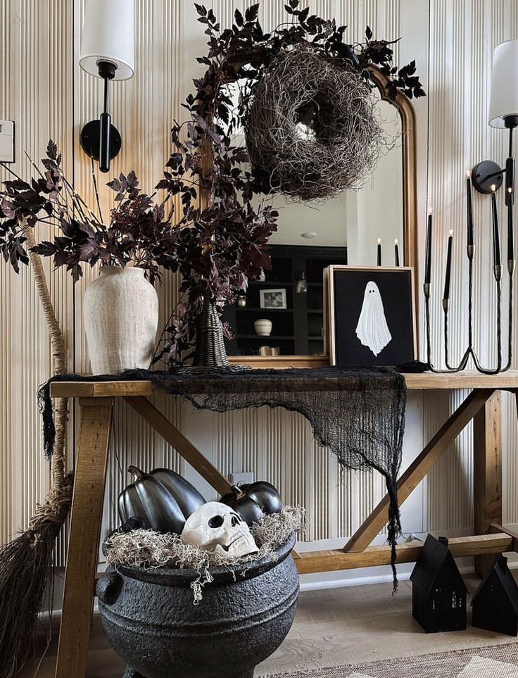 a table with some plants and decorations on it