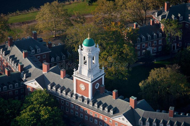 an aerial view of a building with a clock tower