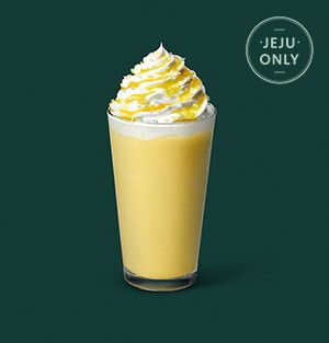 a yellow drink with whipped cream on top and the words jeju only above it