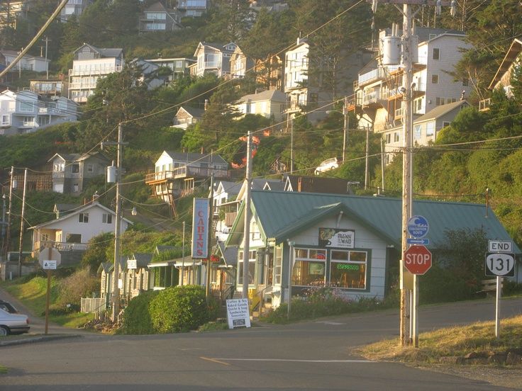 a street with lots of houses on the hill