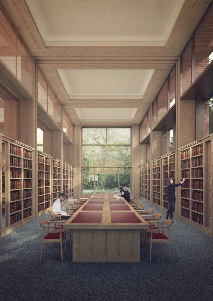 an empty library with tables and chairs in it