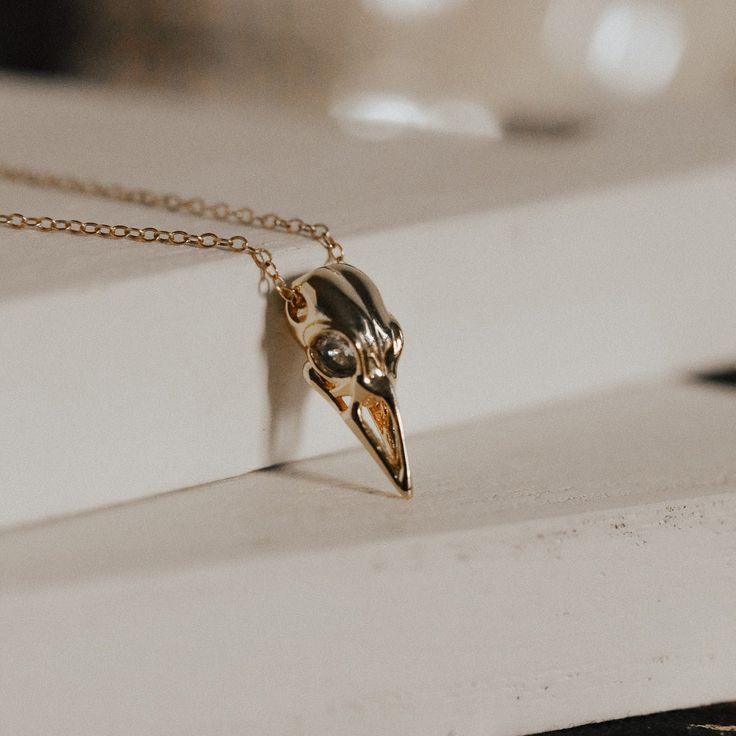 Raven Skull Necklace | The Gilded Witch Gold Raven Skull Necklace, Yellow Gold Skull Jewelry For Gift, Gold Goth, Afro Jewelry, Raven Skull Necklace, Silver Jewelry Accessories, Witch Spirituality, Mode Hippie, Raven Skull