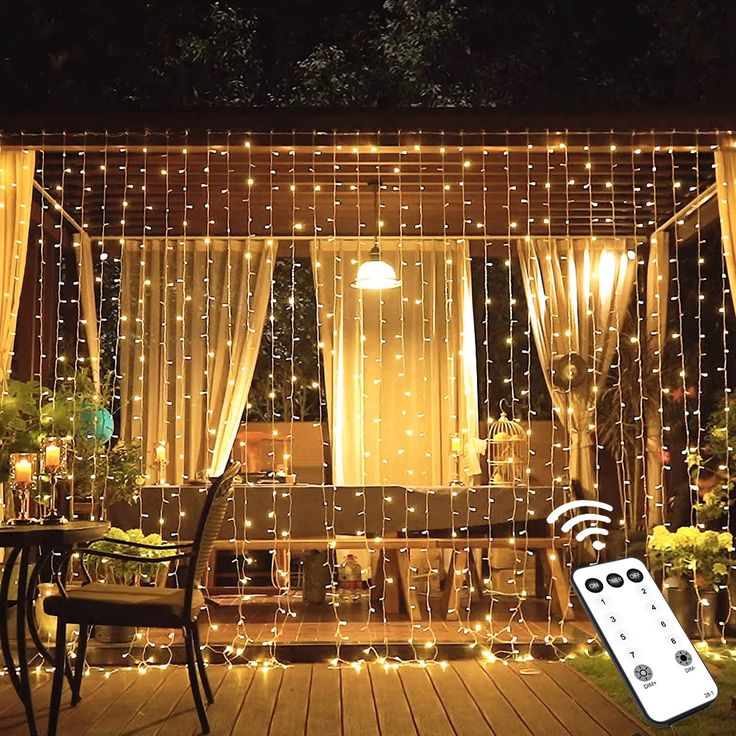 PRICES MAY VARY. ULTRA-LONG 600 LED CHRISTMAS CURTAIN LIGHTS - The Christmas curtain lights (non-connectable) come with 20 light strands, each containing 30 LEDs for a total of 600 LEDs. It gives off a warm soft glow, and really adds a nice touch of oomph to your home. The 19.6ft curtain string lights are 2 times the length of general ones, making them sufficient to cover most windows and walls, great for your room decor. NOTE: for stability of light brightness, multiple sets of these lights can Curtain Lights Outdoor, Christmas Curtain Lights, Cozy Backyard Ideas, Hanging Lights For Bedroom, Creative Display Ideas, Hot Tub Privacy, Led Window, Christmas Light Curtains, Solar Christmas Lights