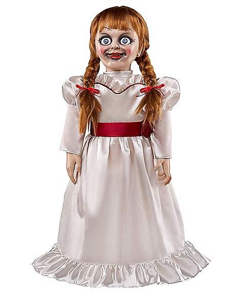 a creepy doll with long hair and red eyes