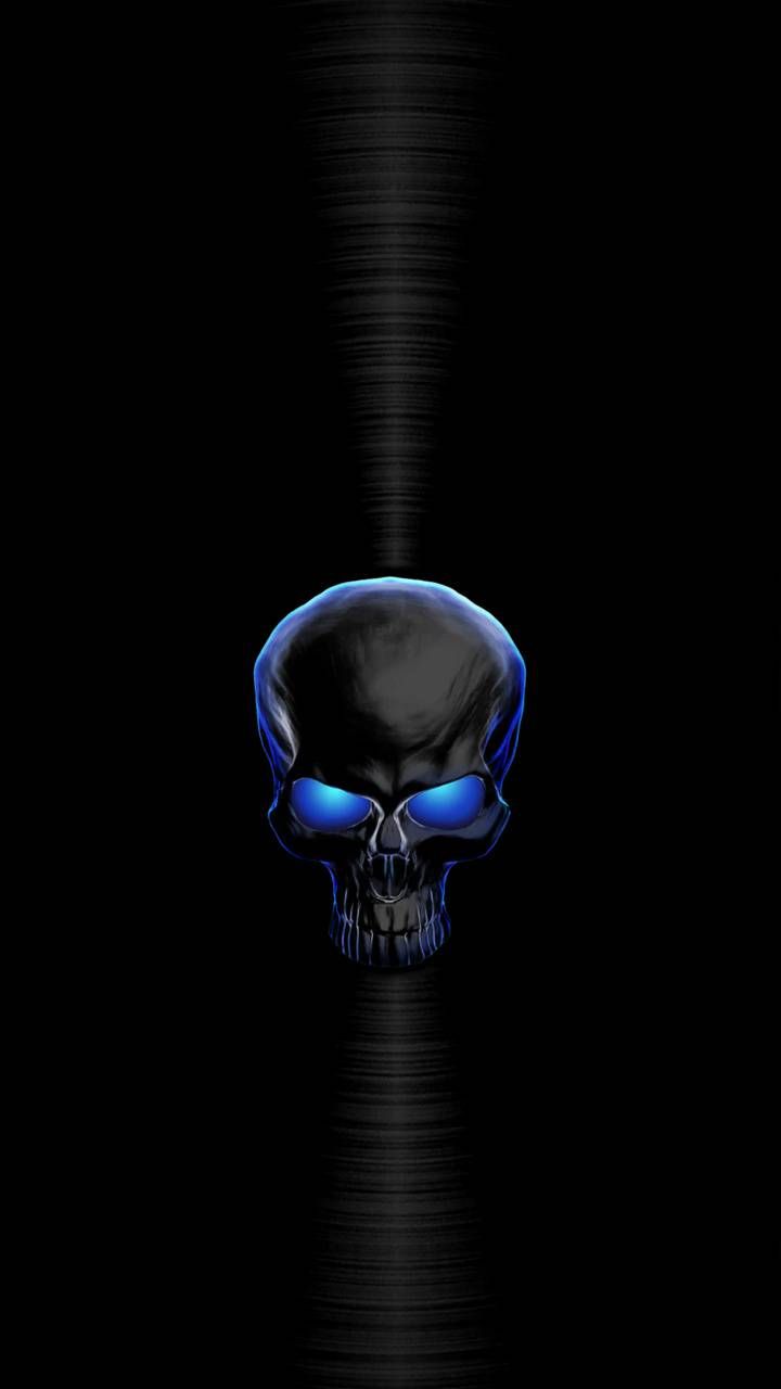 a blue and black skull on a black background