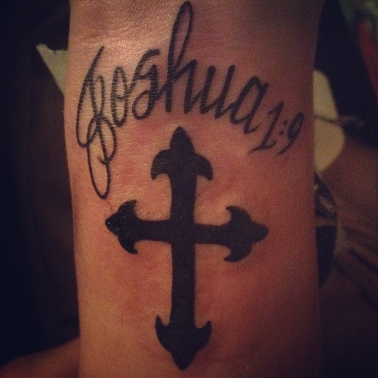 a cross tattoo with the word joshua on it