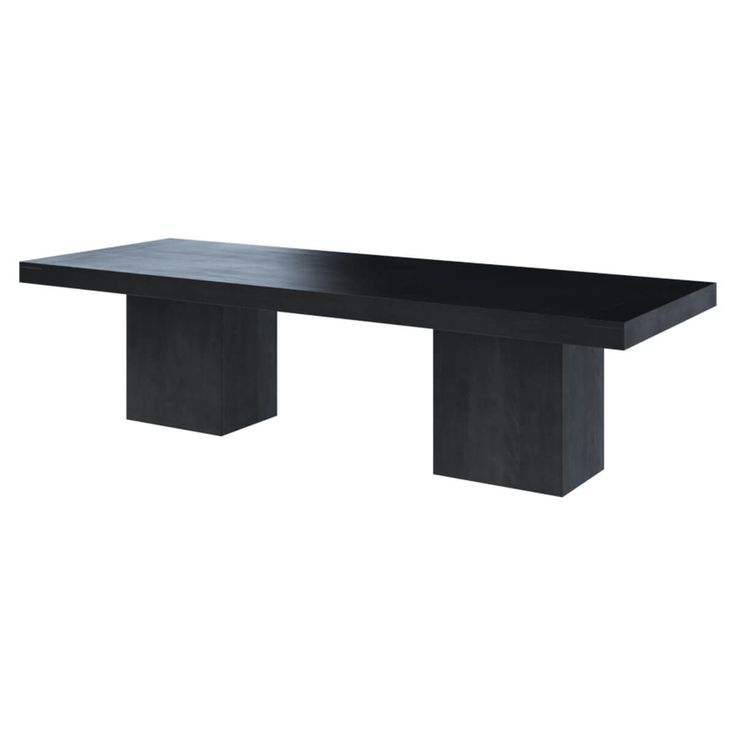 a black table sitting on top of a white wall