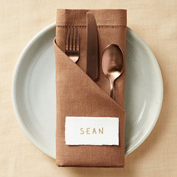 a napkin with a fork and spoon on it