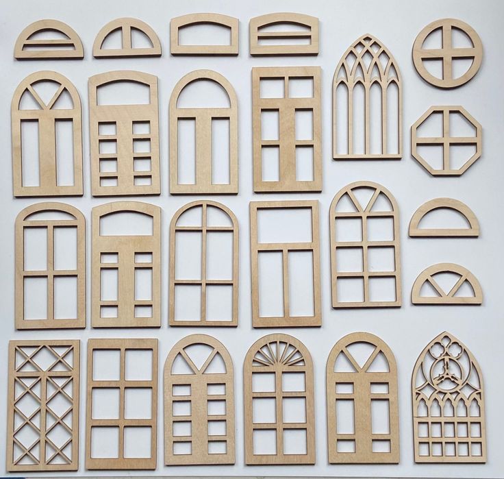 wooden cutouts of arched windows and doors