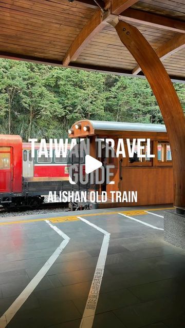 a train traveling through a train station next to a wooden platform with the words taiwan travel guide written on it