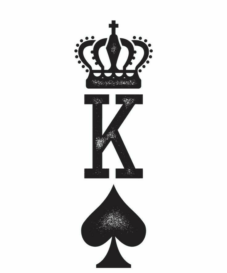 the letter k with a crown on top and playing cards below it, in black and white