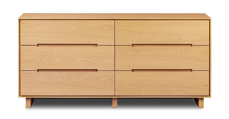 the chest of drawers is made from wood and has four drawers on each side, with three