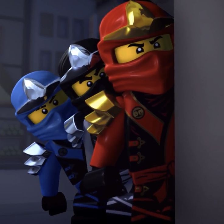 the lego ninjas are all dressed up in different colors and sizes, with one person holding