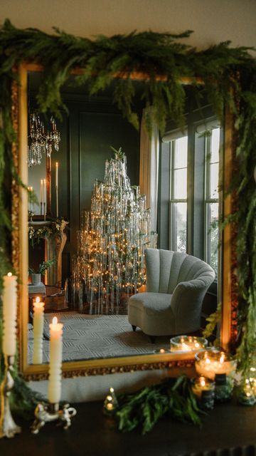 a living room decorated for christmas with candles