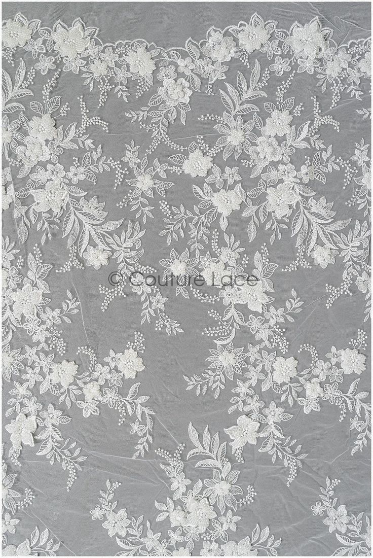 white lace with flowers on grey background