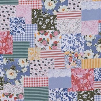 a patchwork quilt with many different colors and patterns on it's sides, including flowers