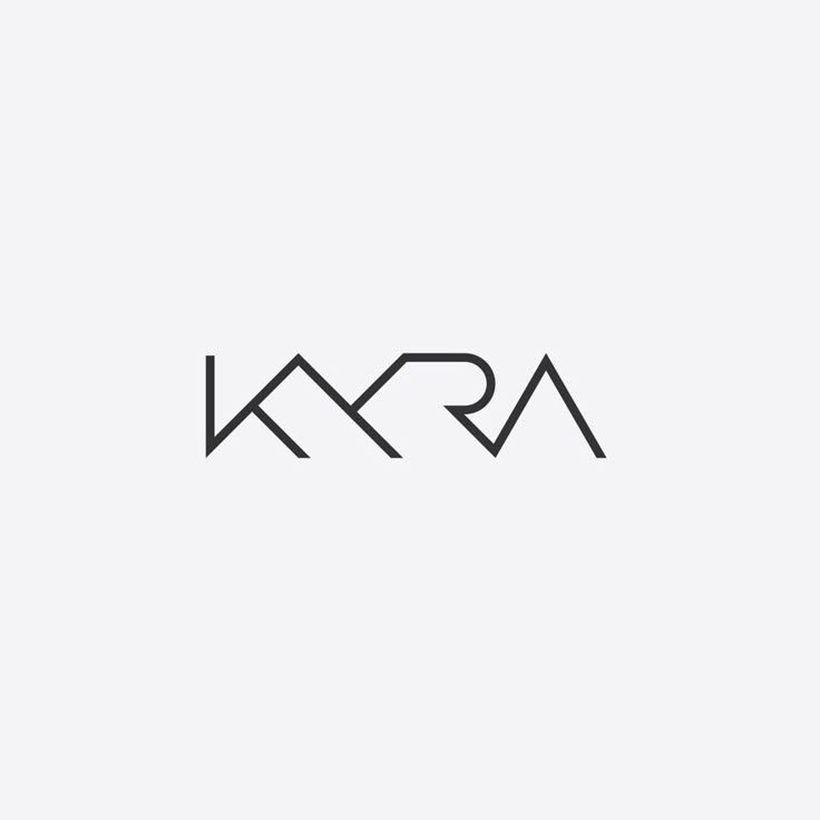 the letters kra are black and white on a plain background, with an arrow in the middle