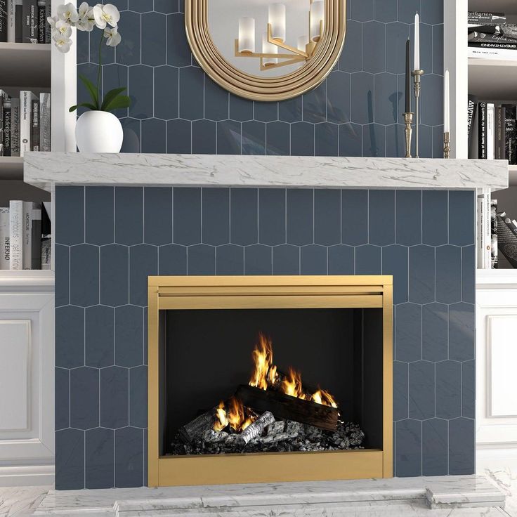 a fireplace in a living room next to a book shelf