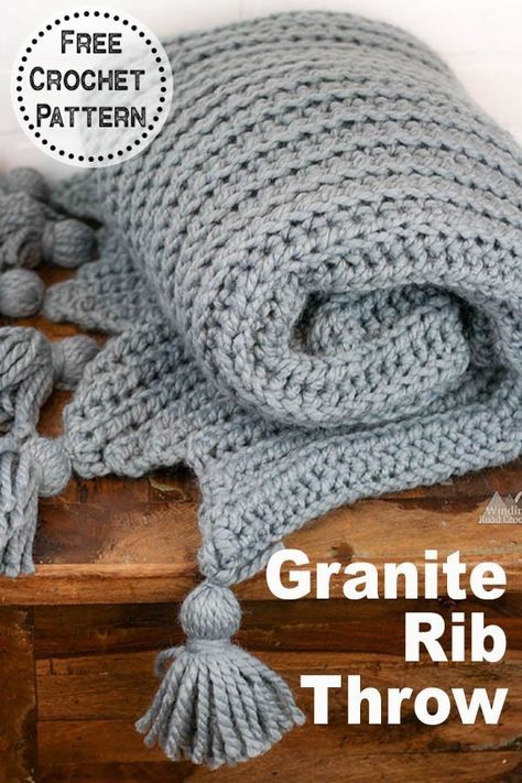 a gray crocheted blanket with tassels on top and text overlay that reads, free crochet pattern granite rib throw