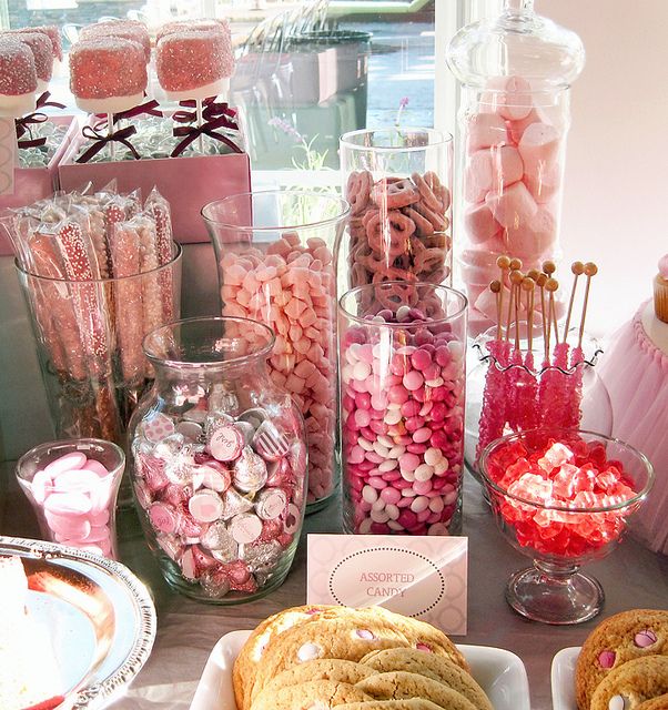 a table topped with lots of candy and candies