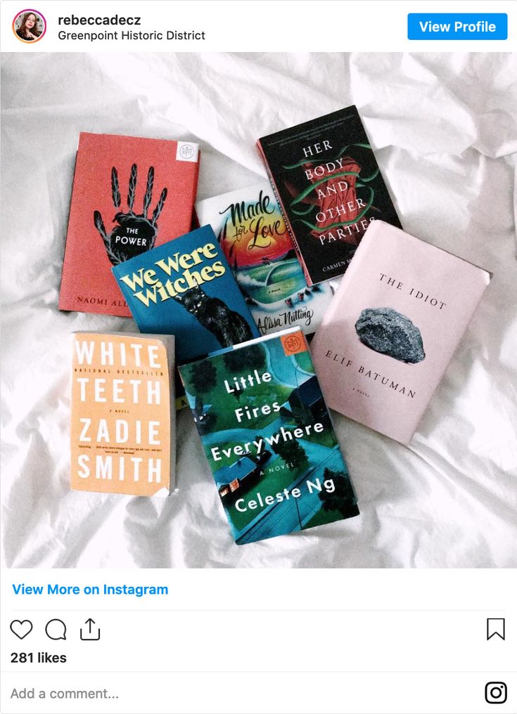 there are five different books on the bed