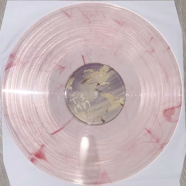 a white record with red ink on it