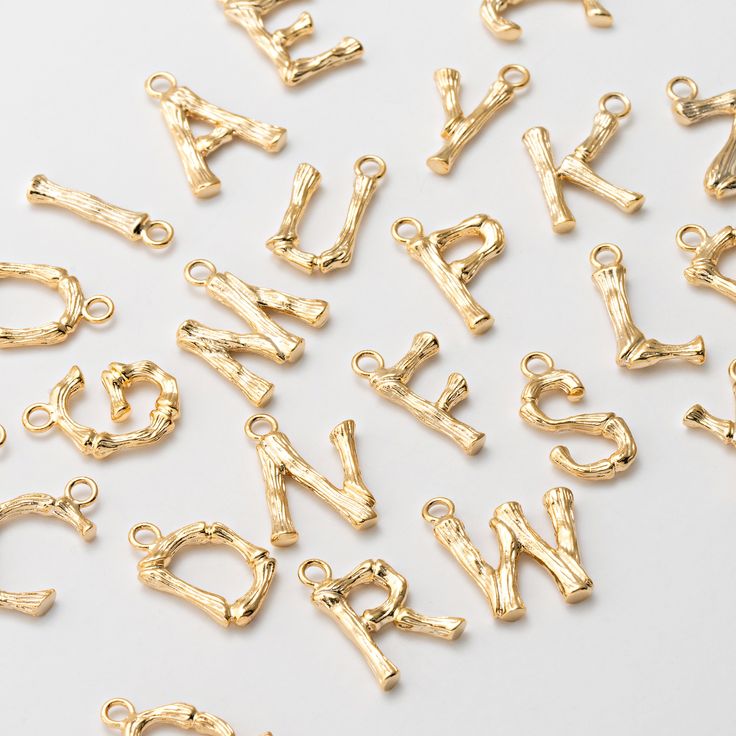 4PCS - Bamboo Alphabet Initial, Letter Bamboo charms, Dangle Personalized Pendant, Bamboo necklace, Real 14K Gold Plated [P0906-PG] Item Details Measurement: width : 10x17mm - (ring size : .3.5mm, thickness : 1mm)  Material: Brass Color:  Real 14K Gold Plated Quantity: 4 Pieces Country of Origin : South Korea **Related Item https://www.etsy.com/listing/675029703/gold-hoop-12mm-earring-vintage-hoop?ga_search_query=hoop&ref=shop_items_search_2&crt=1 **Birthstone Related items p0369: https://www.etsy.com/shop/DesignInYourHeart/search?search_query=p0369&view_type=list&ref=shop_search p0368: https://www.etsy.com/shop/DesignInYourHeart/search?search_query=p0368&view_type=list&ref=shop_search p1250: https://www.etsy.com/shop/DesignInYourHeart/search?search_query=p1250&view_type=list&ref=shop_sear Gold Initials Pendant Charm, Gold Pendant Charms With Initials, Bamboo Necklace, L Alphabet, Letter Charm, Personalized Pendant, Letter Charms, Initial Letter, Gold Hoop