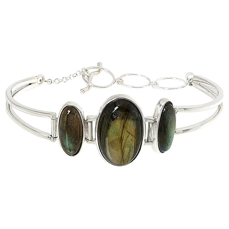 Jay King Gallery Collection Labradorite Toggle Bracelet  With a silhouette similar to a cuff but with the added benefit of a toggle closure, this handcrafted sterling silver and labradorite bracelet is sure to become a favorite jewelry accessory! From Jay's exclusive Gallery Collection.       Approx. 7-1/4"L x 1"W; fits 6-1/2" to 7-1/4" wrist     Stamped .925     Toggle closure     Sterling silver, split-top bracelet has oval, labradorite cabochon bezel-set in center     Center station connects Tab Setting, Split Top, Labradorite Bracelet, Labradorite Cabochon, Toggle Bracelet, Turquoise Cuff, Sterling Silver Cuff Bracelet, Aquamarine Stone, Sleeping Beauty Turquoise