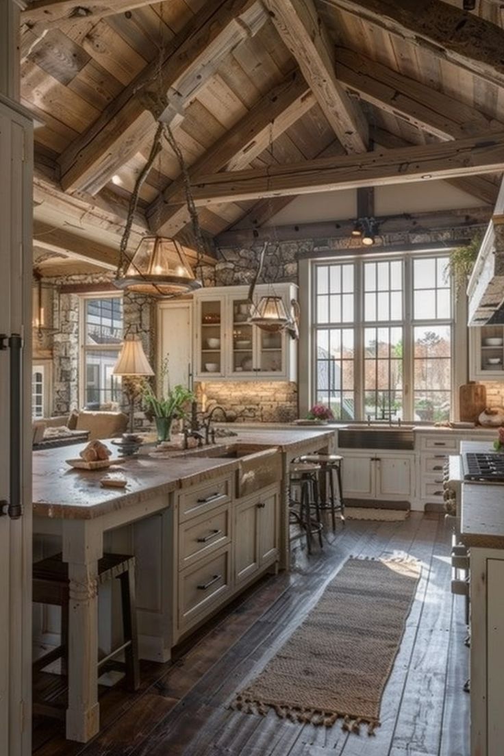 a large kitchen with wooden ceilings and white cabinets