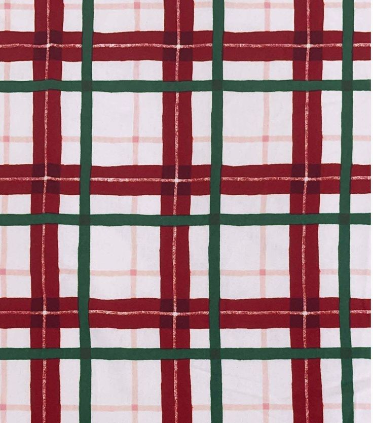 a red and green plaid pattern on white fabric