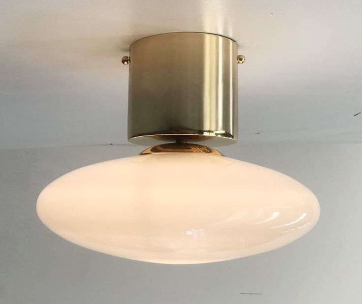 a light fixture hanging from the ceiling in a room