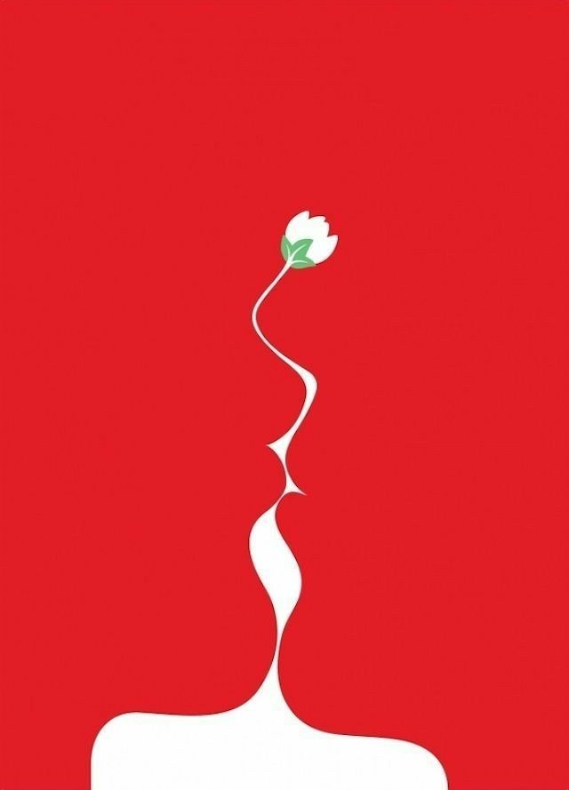 a red and white poster with a flower in the shape of a woman's head